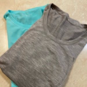Lululemon size 8 workout tee shirts.